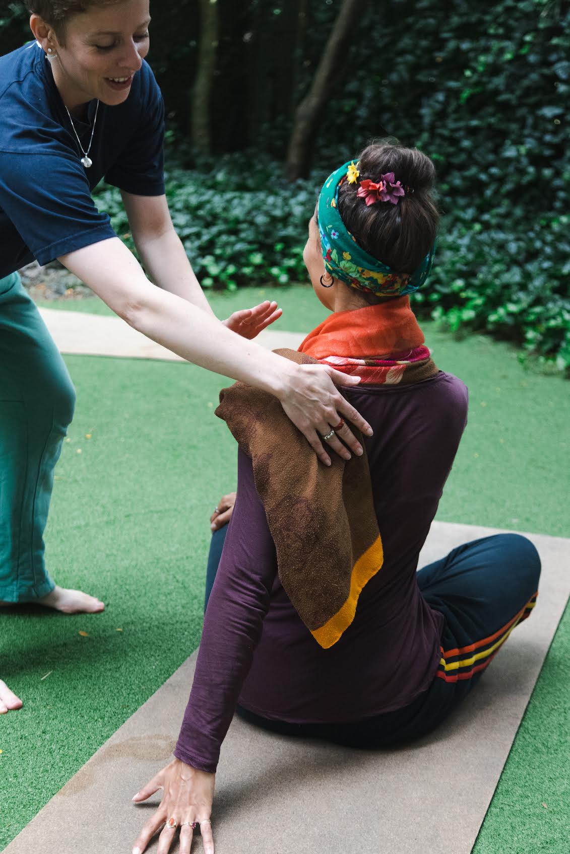 Personal trainer guiding client during a session